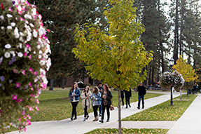Students walking outside. Links to Beneficiary Designations Students walking outside. Links to Beneficiary Designations