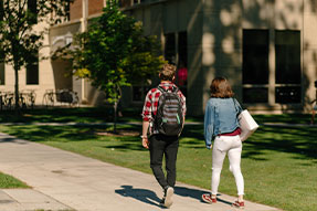 Photo of students walking on campus. Link to Tangible Personal Property.