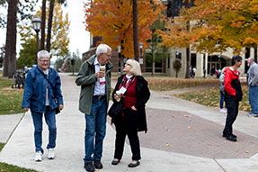 Photo of people on campus. Link to Gifts That Pay You Income.