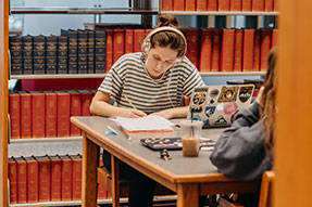Photo of students studying. Link to Gifts of Appreciated Securities.